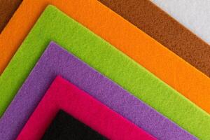 Colorful background pattern and texture of colored felt board. photo