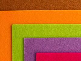 Colorful background pattern and texture of colored felt board. photo