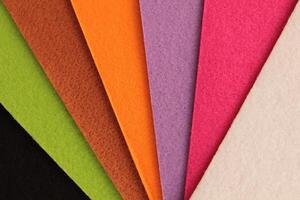 Colorful background pattern and texture of colored felt board. photo