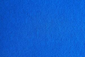 Purple and blue background pattern and texture of colored felt board. photo