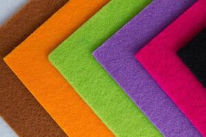 Colorful background pattern and texture of colored felt board. photo