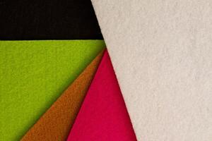 Colorful background pattern and texture of colored felt board. photo