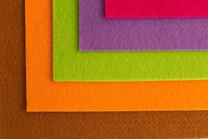 Colorful background pattern and texture of colored felt board. photo