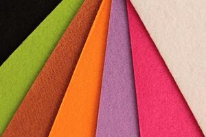 Colorful background pattern and texture of colored felt board. photo