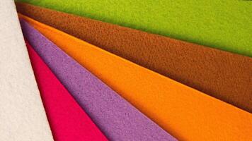 Colorful background pattern and texture of colored felt board. photo