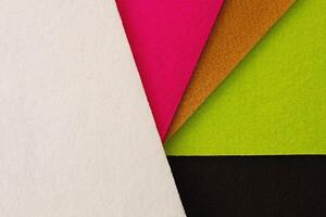 Colorful background pattern and texture of colored felt board. photo