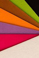 Colorful background pattern and texture of colored felt board. photo