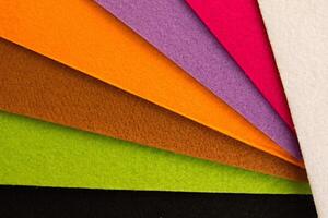 Colorful background pattern and texture of colored felt board. photo