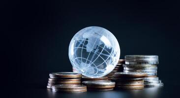 Global Economy Concept with Coins and Globe photo