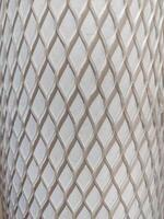 white oxygen cylinder protective cover net like texture or pattern photo