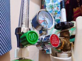 an oxygen cylinder regulator for respiratory aids in hospitals for medical purposes photo