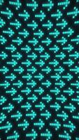 Vertical - motion background with a pattern of glowing green pixelated digital arrows gently moving across the frame. Full HD and looping retro technology animation. video