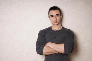 man with crossed arms photo