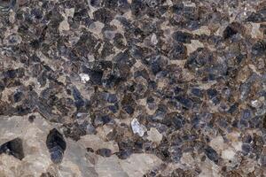 Macro stone Aegirine in charoite on white background photo
