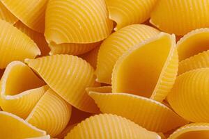 Pasta products in the form of a shell, texture photo