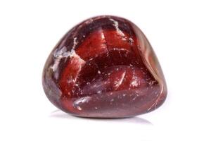 Macro mineral stone jasper on a white background photo