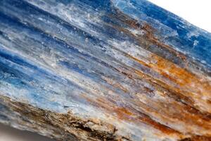 Macro mineral stone Kyanite a white background photo