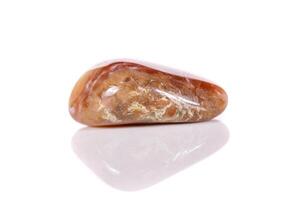 Macro mineral stone jasper on a white background photo