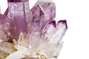 Amethyst Crystal Druse macro mineral on white background photo