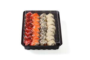 Sushi set in a delivery box on a white background photo