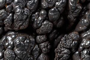 Macro mineral Hematite stone on a white background close-up photo