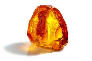 Macro stone mineral amber with insects, flies and beetles on a white background close up photo