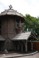 beautiful authentic village house surrounded by greenery. the concept of peace and tranquility photo