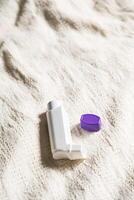 Asthma medication inhaler for emergency of allergic asthma attack symptoms. photo