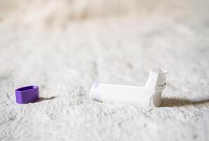 Asthma medication inhaler for emergency of allergic asthma attack symptoms. photo