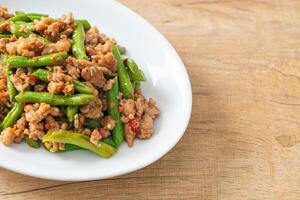 stir-fried french bean or green bean with minced pork photo