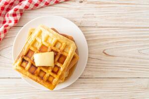 waffle stack with butter and honey photo