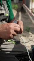 Electrician installs wiring using Connectors for connecting wires in automation and electronics equipment. Connection of electrical wires of electrical appliances video