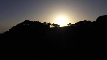 Hill and Trees at Sunrise above Clouds. Cloud Inversion. Aerial Reveal Drone Shot. Madeira, Portugal. Moving Forward and Upwards video
