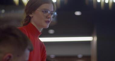 A diverse group of entrepreneurs engages in a dynamic business meeting within a modern office, showcasing their collaborative spirit and innovative approach to business development video