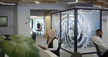 Group of business people brainstorming together in a startup space, discussing business projects, investments, and solving challenges. video