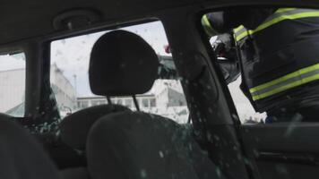 A skilled team of firefighters employs specialized tools and quick reactions to successfully extricate a person trapped in a car, showcasing their heroism and precision in a high-stakes rescue video