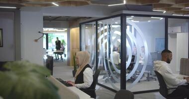 Group of business people brainstorming together in a startup space, discussing business projects, investments, and solving challenges. video