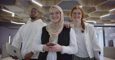 A diverse group of colleagues collaboratively and efficiently tackles various business tasks in a modern office, exemplifying teamwork, productivity, and a dynamic corporate environment. video
