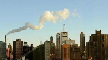 Industrial Pollution Smoke Steam Smog Moving over Urban City Buildings video