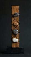 An artistic sculpture is created by combining stones and wooden blocks to display a mix of natural elements and craftsmanship, reflecting a modern art style with a variety of textures. Phone wallpaper photo