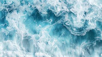 Captured from a stunning aerial view, the immense force and beauty of ocean waves in motion showcase the seas dynamic energy and natural magnificence, revealing a truly breathtaking sight photo