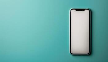 Modern Smartphone with Blank Screen on Turquoise Background photo