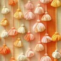 Colorful Tassel Garland on Textured Fabric Background photo