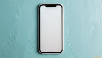 Modern Smartphone on Textured Turquoise Background photo