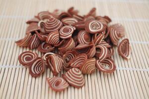 Kue Kuping Gajah, Indonesian traditional snack, with unique shape, sweet, and crunchy. photo