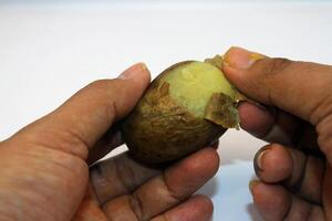 peeling potato skins, peeling potato skins photo