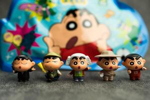 Bangkok, Thailand - June 24, 2024 Crayon Shin chan Q Cute Doll Mini Changing Series model from UNiPOP brand. photo