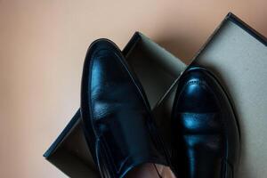 Men shoes in an open box. Open Shoe box. New shoes from the store. photo
