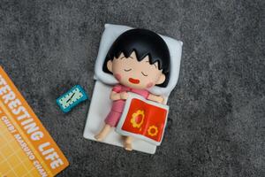 Bangkok, Thailand - June 16, 2024 Overslept Maruko form POP MART Chibi Maruko-chan's Interesting Life Series Blind Box. photo