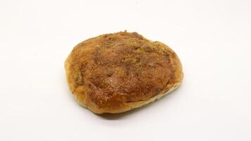 Delicious bread with shredded topping isolated photo